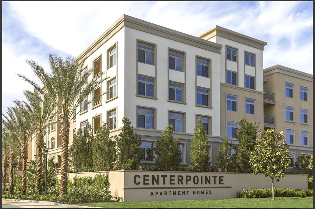 Multi-story residential building elevation showing installed window openings